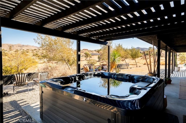 58916 Carmelita Cir, Yucca Valley, CA 92284 - deck featuring a mountain view, a hot tub, and a pergola