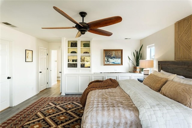 58916 Carmelita Cir, Yucca Valley, CA 92284 - bedroom with wood finished floors and ceiling fan