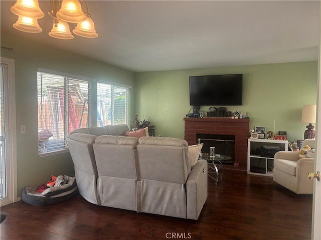 116 Evergreen Pl, Perris, CA 92571 - living area featuring a brick fireplace and dark wood-style floors