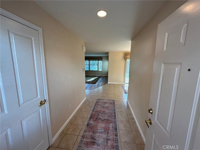 1061 Mountain View Dr, Hemet, CA 92545 - hall featuring light tile patterned flooring, baseboards, and recessed lighting
