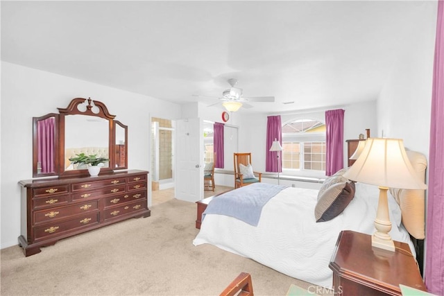 8381 E Hendrie St, Long Beach, CA 90808 - bedroom with light colored carpet, a ceiling fan, and baseboards