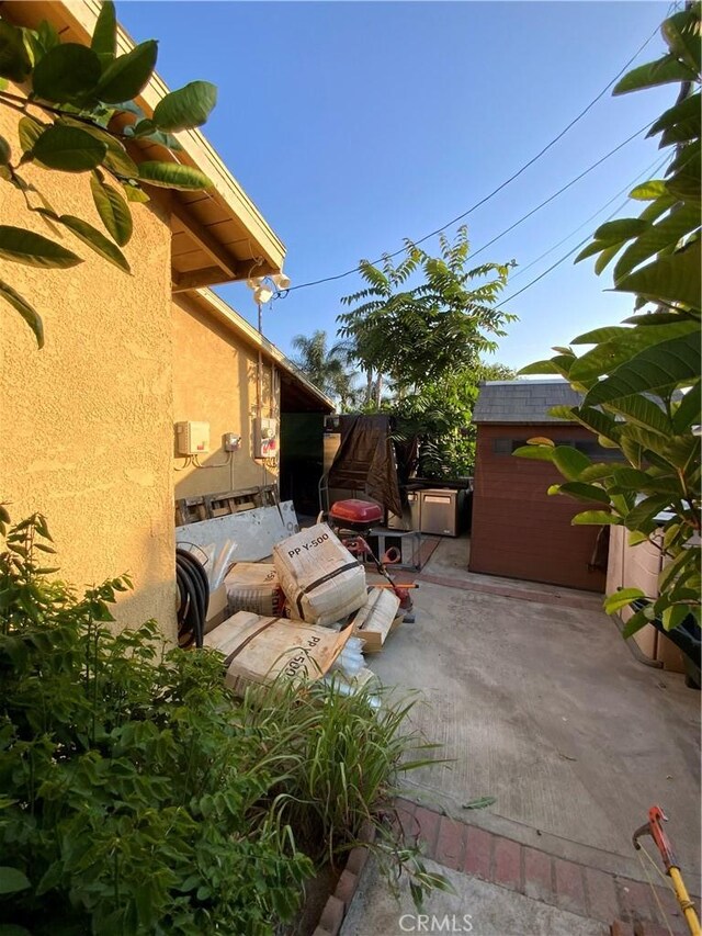 12536 Fineview St, El Monte, CA 91732 - view of patio with a storage unit