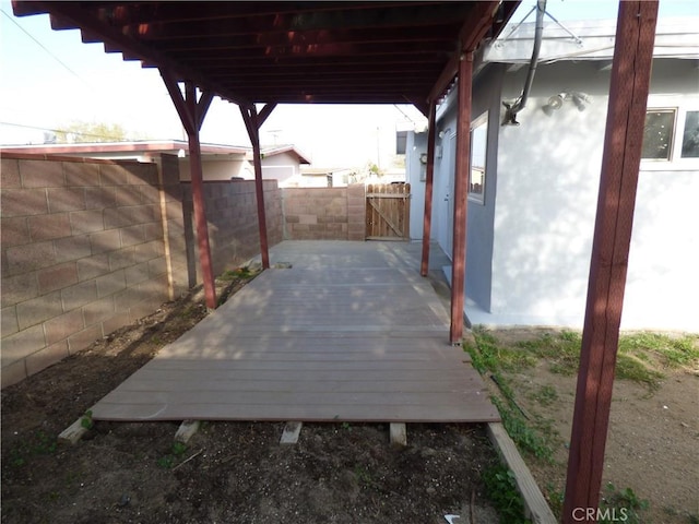 38565 Malby Ave, Palmdale, CA 93550 - fenced backyard with a gate and a wooden deck
