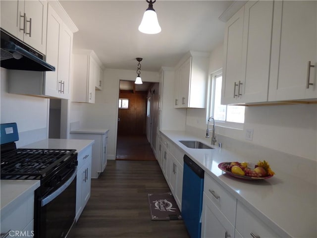 38565 Malby Ave, Palmdale, CA 93550 - kitchen featuring gas range, dishwashing machine, a sink, under cabinet range hood, and dark wood-style floors