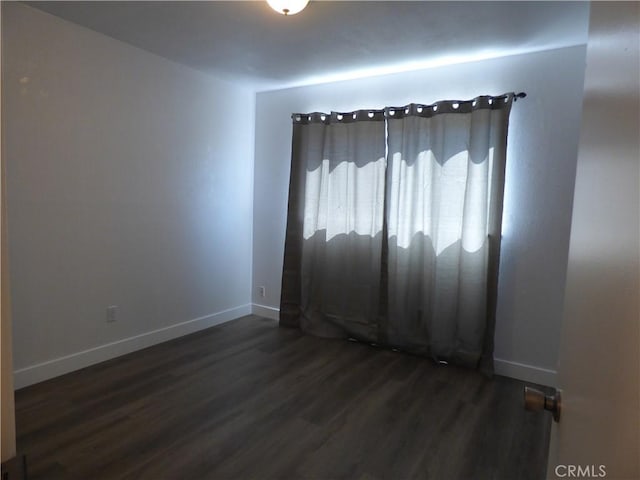38565 Malby Ave, Palmdale, CA 93550 - spare room featuring dark wood finished floors and baseboards