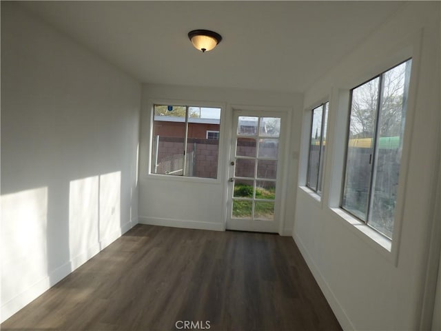 38565 Malby Ave, Palmdale, CA 93550 - unfurnished sunroom featuring baseboards and wood finished floors
