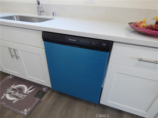 38565 Malby Ave, Palmdale, CA 93550 - kitchen with dishwasher, a sink, dark wood finished floors, white cabinetry, and light countertops