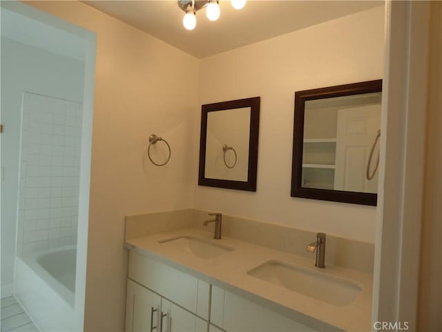 38565 Malby Ave, Palmdale, CA 93550 - bathroom with double vanity and shower / bathtub combination