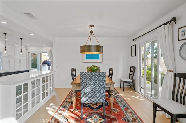 28332 Via Alfonse, Laguna Niguel, CA 92677 - dining room featuring healthy amount of natural light, recessed lighting, baseboards, and light wood finished floors