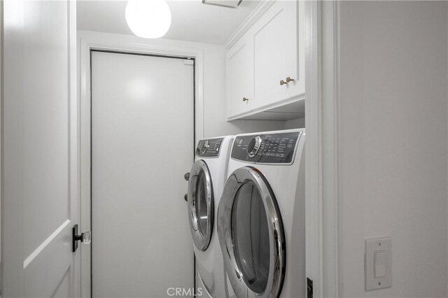 28332 Via Alfonse, Laguna Niguel, CA 92677 - washroom featuring cabinet space and independent washer and dryer