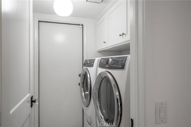 28332 Via Alfonse, Laguna Niguel, CA 92677 - washroom with cabinet space and washer and dryer