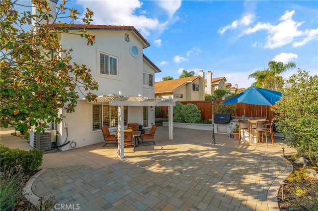 28332 Via Alfonse, Laguna Niguel, CA 92677 - view of patio with a pergola, central AC unit, and outdoor dining space