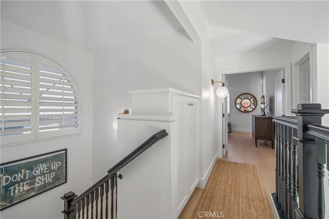 28332 Via Alfonse, Laguna Niguel, CA 92677 - hall featuring an upstairs landing, light wood-style floors, and beam ceiling