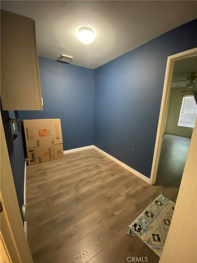 43321 Cottage Ln, Lancaster, CA 93536 - washroom featuring wood finished floors and baseboards