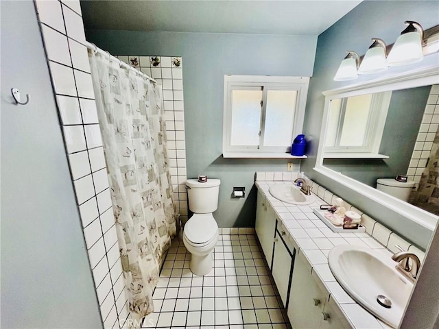 21161 Rancherias Rd, Apple Valley, CA 92307 - full bathroom featuring double vanity, tile patterned floors, and a shower with shower curtain