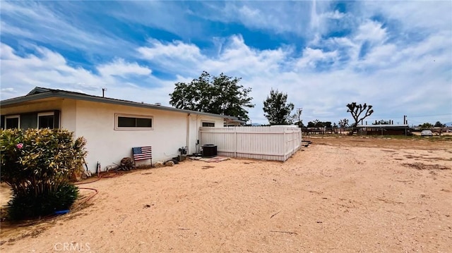 21161 Rancherias Rd, Apple Valley, CA 92307 - view of home's exterior featuring stucco siding and cooling unit