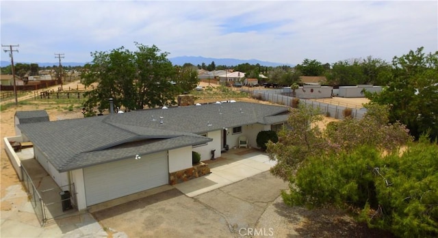 21161 Rancherias Rd, Apple Valley, CA 92307 - aerial view of property and surrounding area featuring a mountainous background