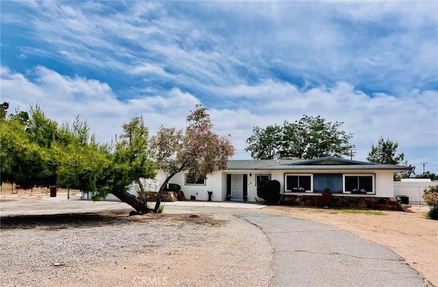 21161 Rancherias Rd, Apple Valley, CA 92307 - ranch-style home with stone siding and stucco siding