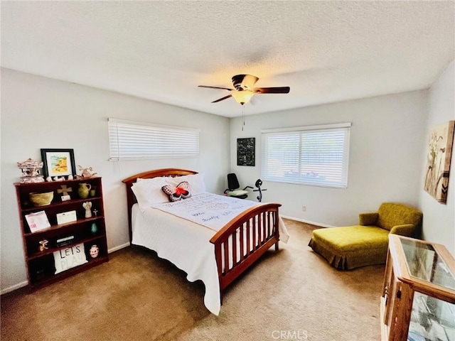 21161 Rancherias Rd, Apple Valley, CA 92307 - bedroom featuring carpet flooring, baseboards, a ceiling fan, and a textured ceiling