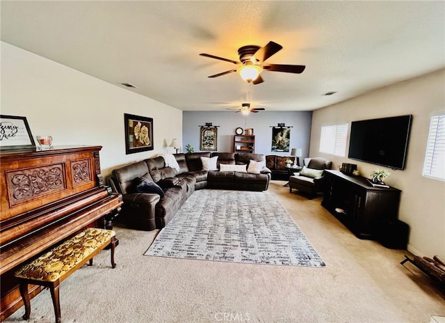 21161 Rancherias Rd, Apple Valley, CA 92307 - living area featuring light carpet and ceiling fan