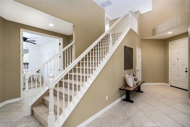 44035 Cindy Cir, Temecula, CA 92592 - stairs featuring tile patterned flooring, a ceiling fan, a high ceiling, and recessed lighting
