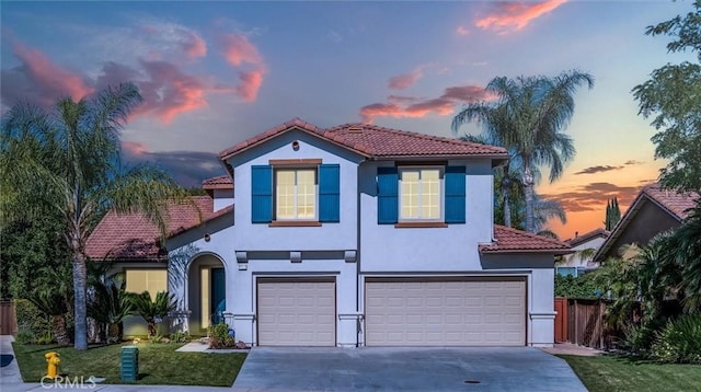 44035 Cindy Cir, Temecula, CA 92592 - mediterranean / spanish home with a tiled roof, a garage, stucco siding, and concrete driveway