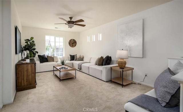 44035 Cindy Cir, Temecula, CA 92592 - carpeted living room featuring a ceiling fan and baseboards