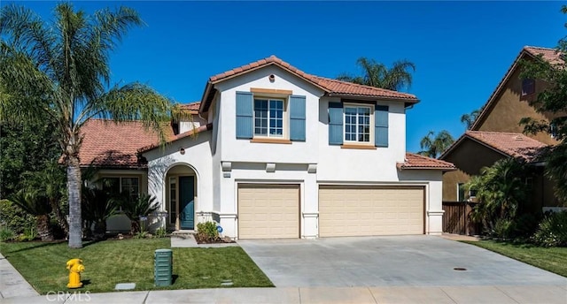 44035 Cindy Cir, Temecula, CA 92592 - mediterranean / spanish home featuring a tile roof, an attached garage, and stucco siding