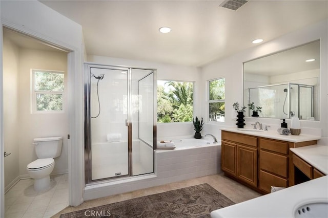 44035 Cindy Cir, Temecula, CA 92592 - full bath with vanity, healthy amount of natural light, a garden tub, a shower stall, and recessed lighting
