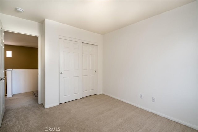 44035 Cindy Cir, Temecula, CA 92592 - unfurnished bedroom featuring light carpet and a closet