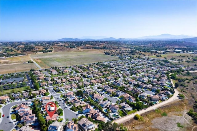 44035 Cindy Cir, Temecula, CA 92592 - aerial overview of property's location featuring a mountain backdrop and nearby suburban area