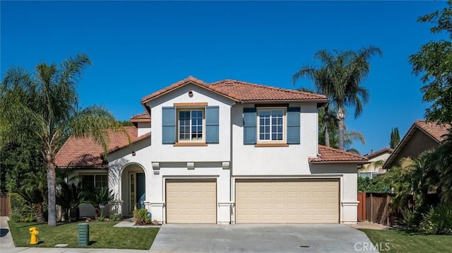 44035 Cindy Cir, Temecula, CA 92592 - mediterranean / spanish-style house featuring a tiled roof, an attached garage, stucco siding, and driveway