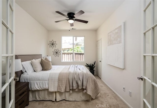 44035 Cindy Cir, Temecula, CA 92592 - bedroom featuring french doors, light colored carpet, and a ceiling fan