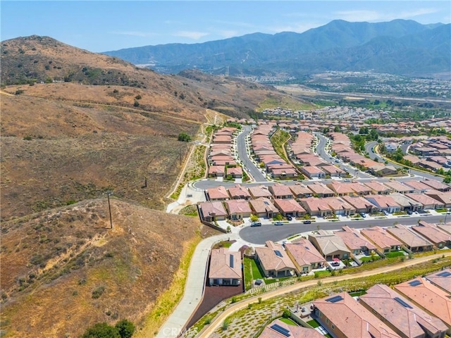 11986 Sagecrest Ct, Corona, CA 92883 - aerial overview of property's location with nearby suburban area and a mountain backdrop