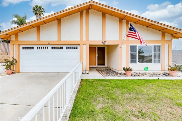 443 Garey Dr, Vista, CA 92084 - view of front of property with an attached garage, stucco siding, concrete driveway, and a front yard