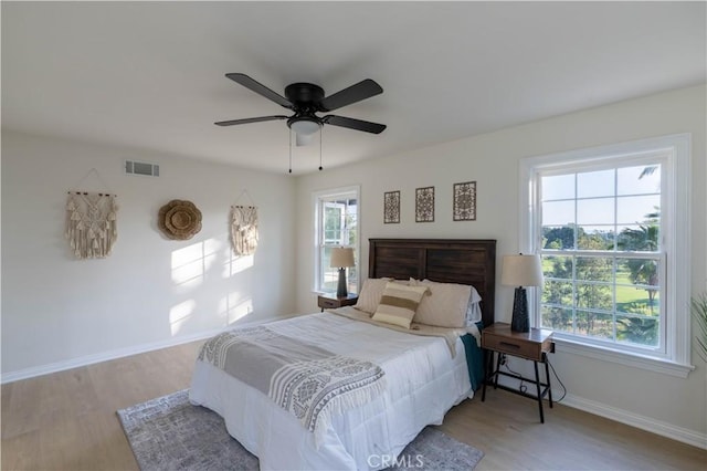 1748 Prince Albert Dr, Riverside, CA 92507 - bedroom featuring baseboards, wood finished floors, and ceiling fan