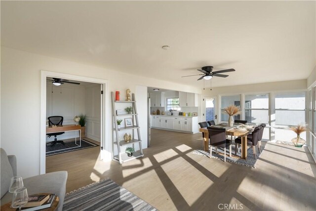 1748 Prince Albert Dr, Riverside, CA 92507 - dining space with a desk, a ceiling fan, and light wood finished floors