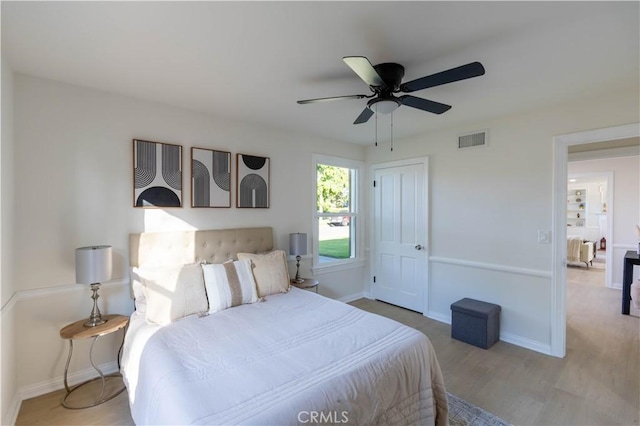 1748 Prince Albert Dr, Riverside, CA 92507 - bedroom featuring wood finished floors, baseboards, ceiling fan, and a closet