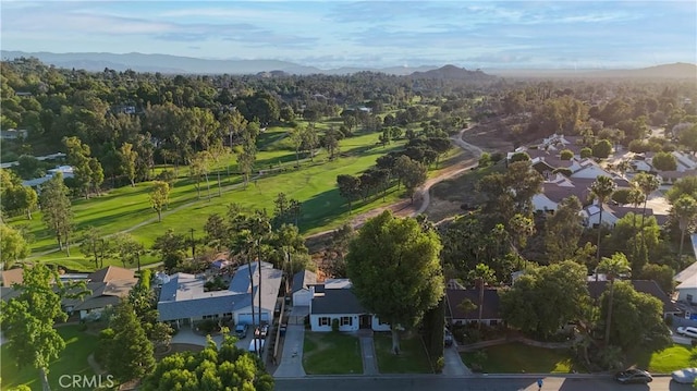 1748 Prince Albert Dr, Riverside, CA 92507 - aerial view of property's location with a mountain backdrop, nearby suburban area, and a golf club