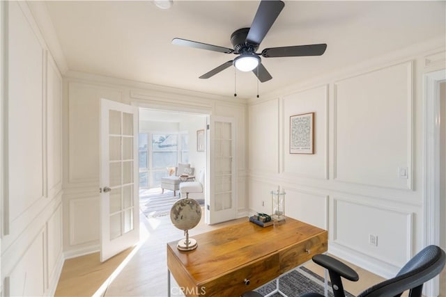 1748 Prince Albert Dr, Riverside, CA 92507 - home office with a decorative wall, french doors, ceiling fan, and light wood-style floors