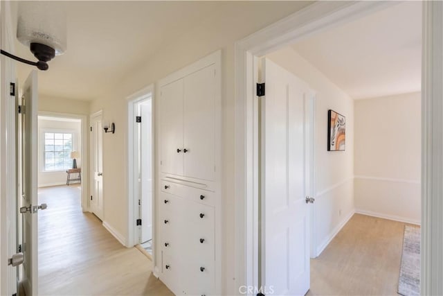 1748 Prince Albert Dr, Riverside, CA 92507 - corridor featuring light wood-type flooring and baseboards