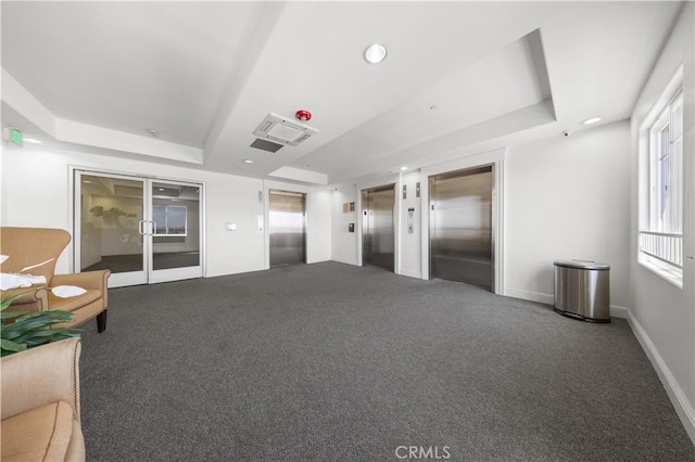 11 S 3rd St Unit 510, Alhambra, CA 91801 - unfurnished living room featuring elevator, a raised ceiling, and recessed lighting