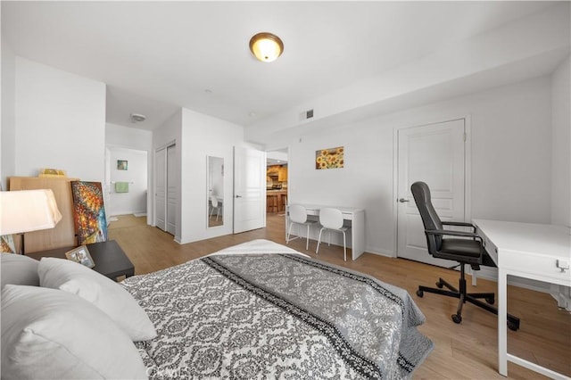 11 S 3rd St Unit 510, Alhambra, CA 91801 - bedroom featuring wood finished floors, an office area, and baseboards