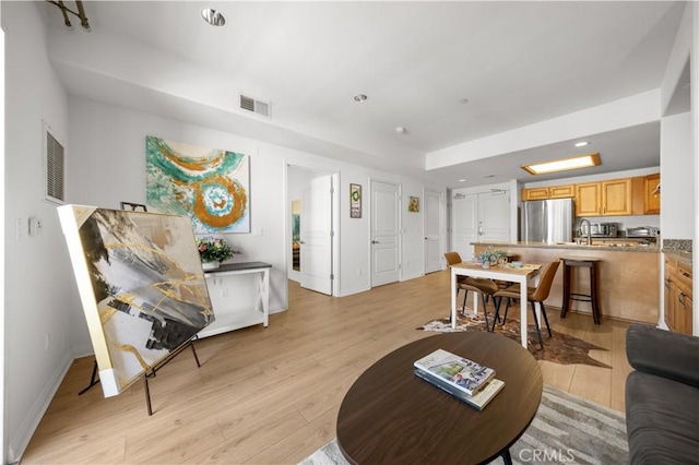 11 S 3rd St Unit 510, Alhambra, CA 91801 - living area with light wood-style flooring, recessed lighting, and baseboards