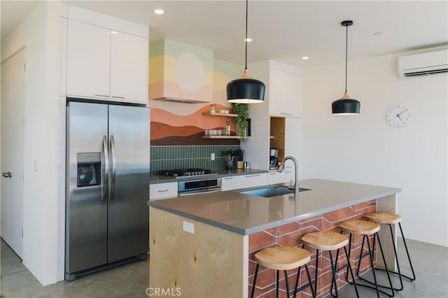 2600 Sunny Vista Rd, Joshua Tree, CA 92252 - kitchen with stainless steel fridge, a sink, ventilation hood, a wall mounted AC, and concrete floors