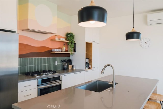 2600 Sunny Vista Rd, Joshua Tree, CA 92252 - kitchen with stainless steel appliances, a sink, modern cabinets, custom exhaust hood, and tasteful backsplash