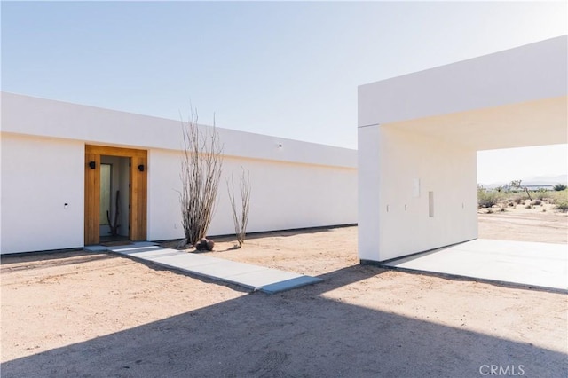 2600 Sunny Vista Rd, Joshua Tree, CA 92252 - view of exterior entry with stucco siding