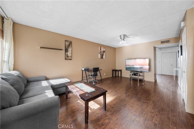 5640 Riverside Dr Unit 119, Chino, CA 91710 - living area featuring ceiling fan, wood finished floors, a textured ceiling, and baseboards