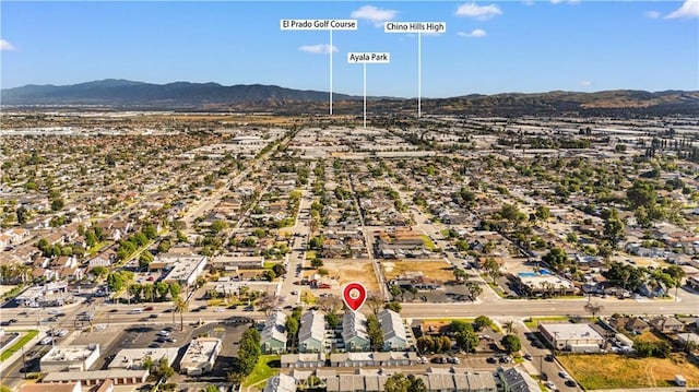 5640 Riverside Dr Unit 119, Chino, CA 91710 - aerial overview of property's location featuring mountains and nearby suburban area