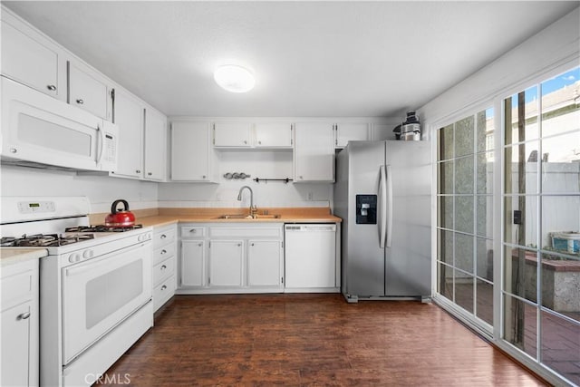 5640 Riverside Dr Unit 119, Chino, CA 91710 - kitchen with white appliances, a sink, light countertops, and white cabinets